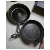 2 cast iron skillets marked tiwain