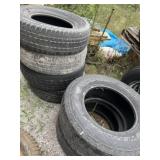Six used truck tires ranging from 17 inch rim