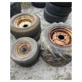 6 small  tractor  tires with rims