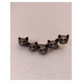 Silver cat face brooch unmarked.   .170oz