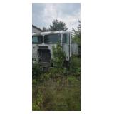 Freightliner cab over semi with trailer in