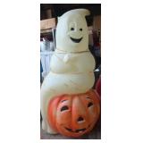 Halloween blow mold featuring ghost on pumpkin by