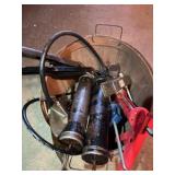 Basket of grease guns and caulking guns