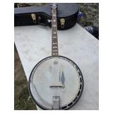 Alvarez 5 string banjo with case and accessories