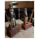 2 mechanical Uncle Sam coin banks one is
