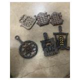 6 cast iron trivets