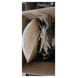 Decorative straw hats and throw blankets