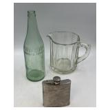 Pluto vintage water bottle, glass pitcher, and