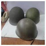 3 military helmets