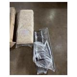 Bench with assembly instructions and parts and