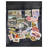 Old postcards and vintage auto racing stickers,
