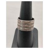 Silver band ring marked 925 size 7.     .205oz