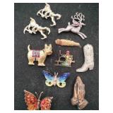 Boot ,butterfly ,praying hands ,dog brooches