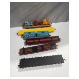 six assorted model train freight and flat cars,