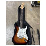 Ion strat style guitar with matching zip case