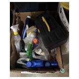 Box full of cleaning and household supplies,