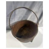 antique, heavy-duty cast iron pot or small