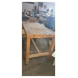 Heavy duty wooden worktable with two built-in