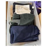 Tote of blankets and sheets and more