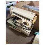 vintage Kenmore sewing machine is likely from the