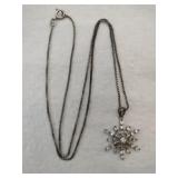 Silver box chain snowflake pendant marked 925.