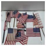Small American flags some stick are broken