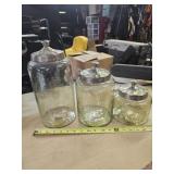 3 pc glass & metal canister set.  5', 8' & 11'h x