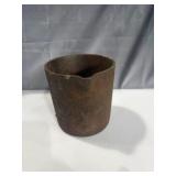 primitive cast iron measuring pot or pouring