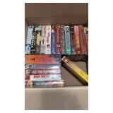 vintage VHS tapes, primarily featuring westerns