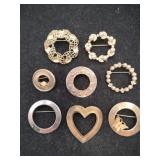 Goldtone round and heart shaped brooches