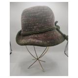woman's wool hat with hat stand
