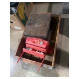bright red cantilever-style tool box or storage