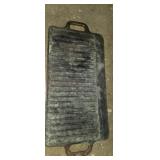 Unmarked cast iron griddle top