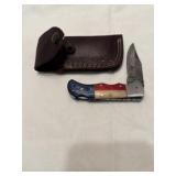 Lockblade knife with leather sheath
