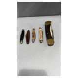 Buck 110 folding hunter knife and other pocket