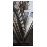 Large assortment of un framed artwork (cart not