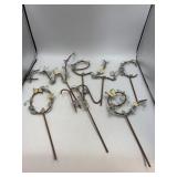 Welcome metal sign with flowers and butterflies