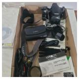 2 lumix digital cameras woth accessories