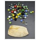 Pouch of marbles and shooters