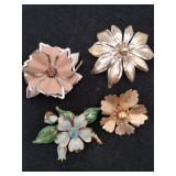 4  flowered brooches