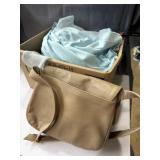 Leather bag and assortment of womenï¿½s clothes,