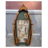Row boat fisherman wall decor.