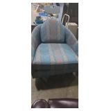 Mcm tub style lounge chair with blue striped
