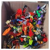 Assorted lego bionicle pieces