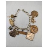 10K gold filled charm bracelet.   1.040oz