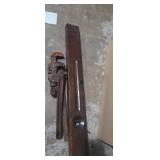 Wooden level and pipe wrenches