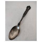 Silver decorative handle Marked Sterling.