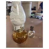 L.E. Smith amber glass oil lamp and a Plume &