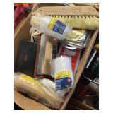 Paint supplies, including rollers, brushes, and