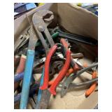 Pliers, pliers, pliers, pliers, and a wrench